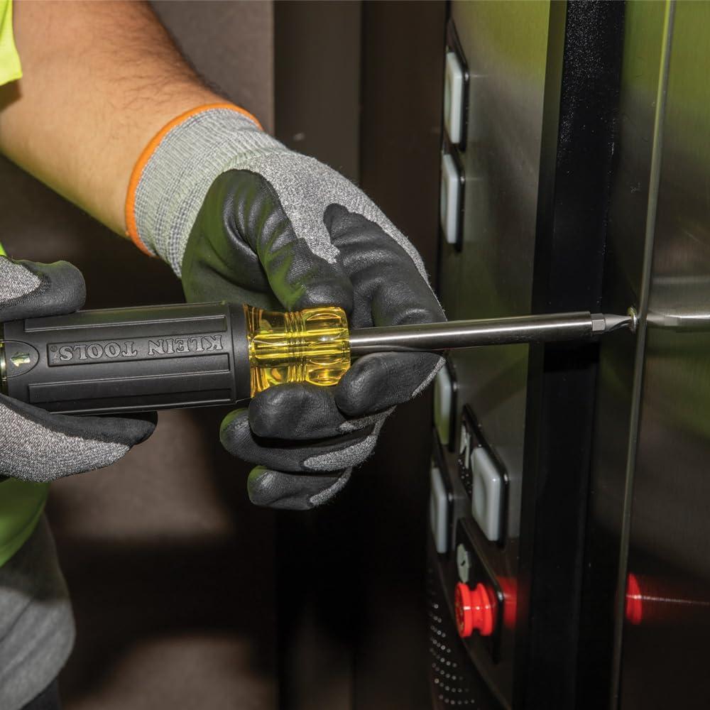 imageKlein Tools 32307 Multibit Tamperproof Screwdriver 27in1 Tool with Torx Hex Torq and Spanner Bits with 14Inch Nut DriverScrewdriver
